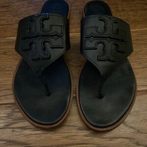Tory Burch Weston full logo sandals in black.